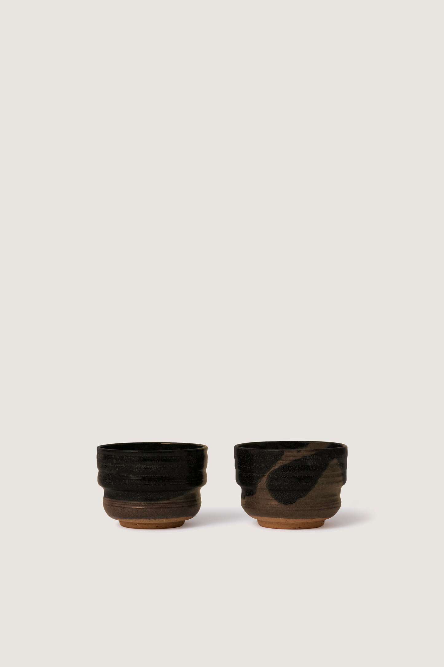 PAIR BROWN OF ATELIER PIERRE CULOT BOWLS